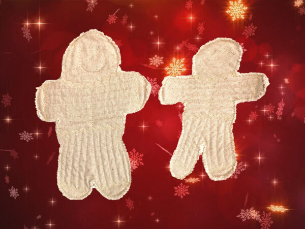 Gingerbread men Quiltoys on background Gingerbread men Quiltoys on background