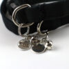 cat charms close up black